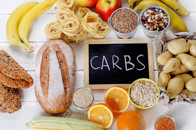A selection of carbohydrate-rich foods, relevant to a weight-loss focused nutrition guide.