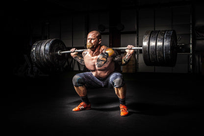 Man preparing a whey protein isolate shake